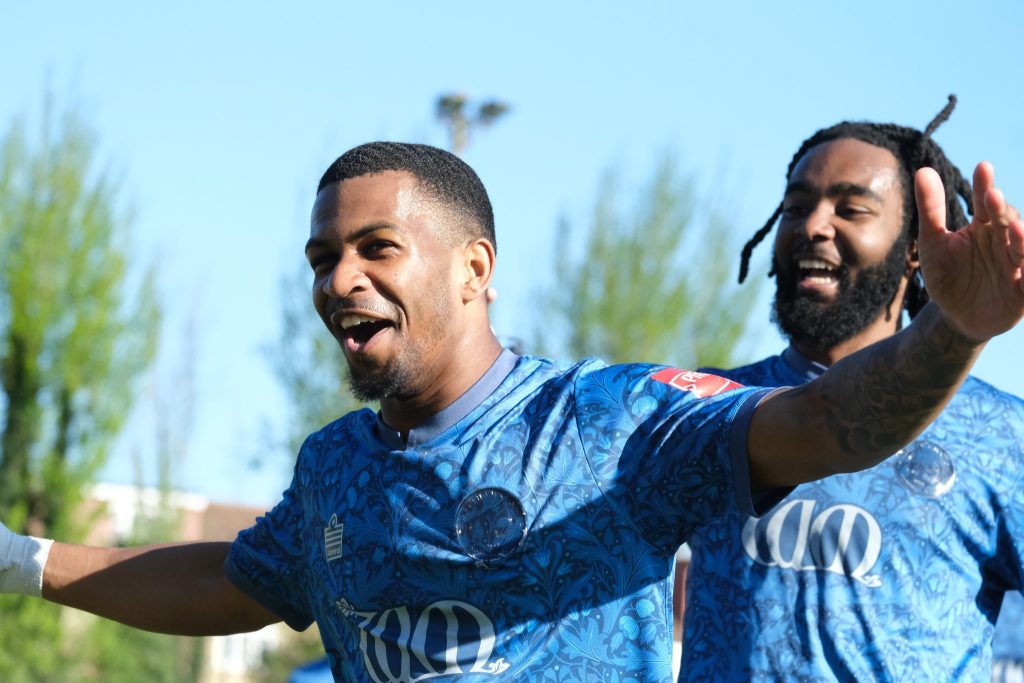 junior baker of walthamstow celebrates scoring against redbridge